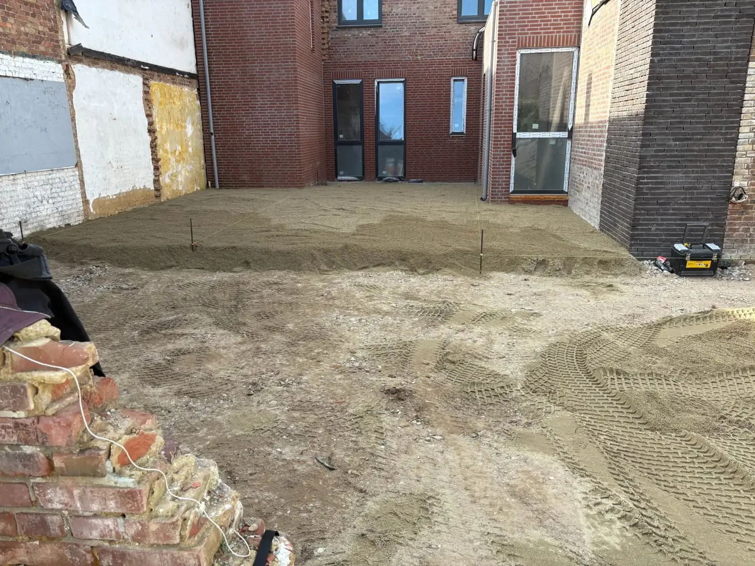 Zandbed voor bestrating, Tuinbazen